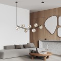 Lampa wisząca do salonu i jadalni w kolorze czarno-złotym z grafitowymi kloszami kulkami.