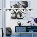 Lampa nowoczesna z kloszami  kulami  do dużego salonu . Poziomy stelaż czarny.
