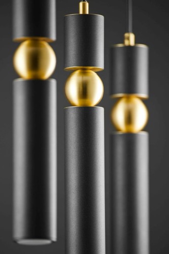 Lampa wisząca liniowa  z 3 spotami w kolorze czarno-złotym.