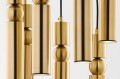 Efektowna złota lampa wisząca z 7 tubami złotymi.