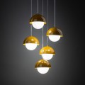 Lampa kolorowa designerska i wisząca. Pięć punktów światła w kolorze ochra.