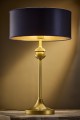 Elegancka złota lampa gabinetowa z granatowym kloszem.