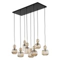 Lampa wisząca z kloszami szklanymi ryflowanymi w kolorze koniakowym.