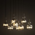 Lampa wisząca nad stół do dużego salonu z kloszami szklanymi w kolorze koniakowym . Szkło ryflowane.