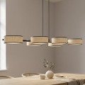 Regulowana lampa do salonu nad stół z kloszami z rattanu.