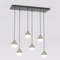 Duża beżowa lampa nad stół w stylu skandynawskim.