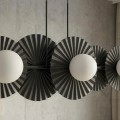 Designerska lampa wisząca nad stół do salonu.