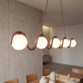 Burgundowa wisząca lampa szeroka nad stół do designerskiego salonu i kuchni.