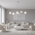 Designerska lampa wisząca nad stół w kolorze szarym z kloszami białymi.