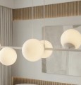 Szara nowoczesna lampa wisząca nad stół do salonu.