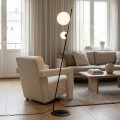 Designerska  czarna lampa podłogowa z 2 kulkami  białymi.