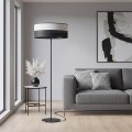 Designerska lampa podłogowa z abażurem w kolorach czarnym i szarym.