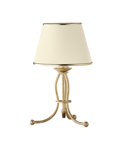 Kremowo złota lampa nocna z abażurem w kolorze ecru.